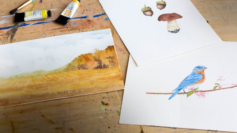 Paintings of landscape, acorn, mushroom and bird