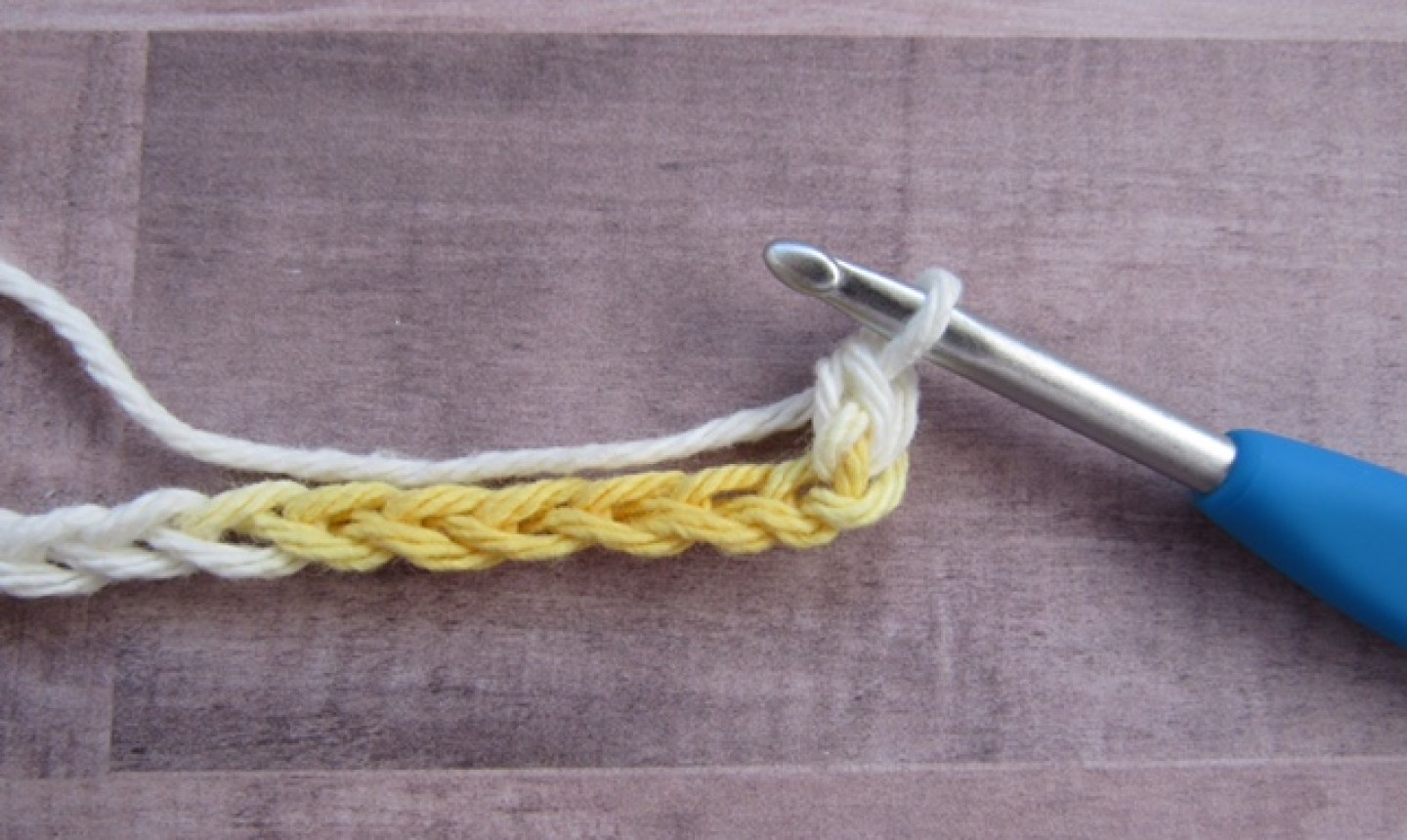 Crocheted yarn with hook