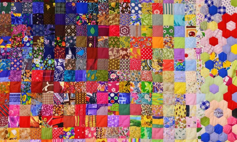 Lots of tiny quilt squares and hexagons
