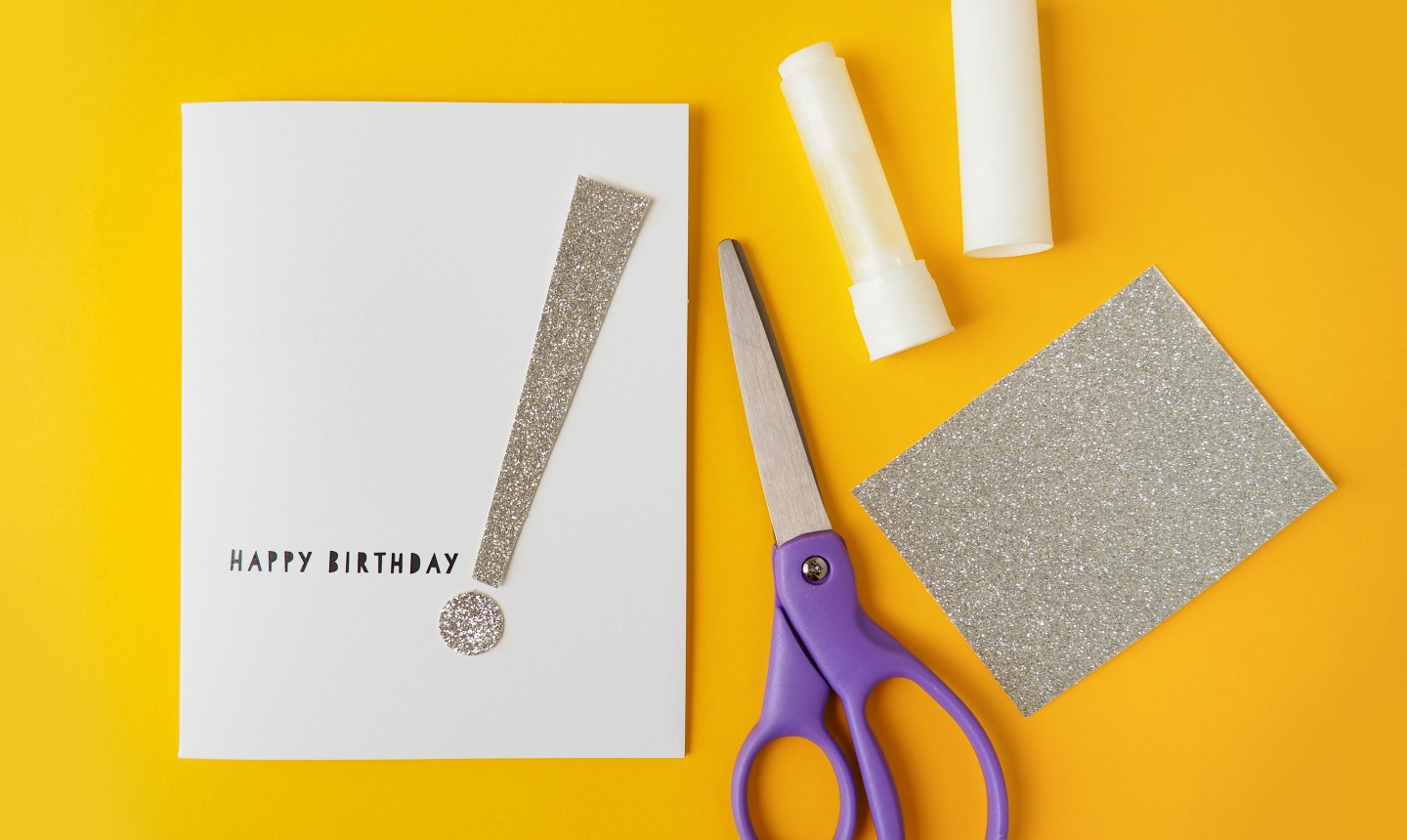 Paper Cutout Happy Birthday Greeting with Gold Glitters Greeting