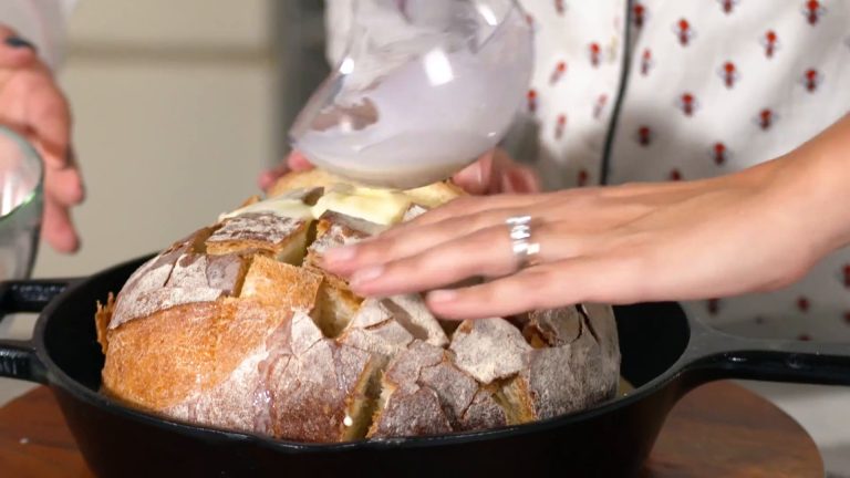 Pouring something over bread