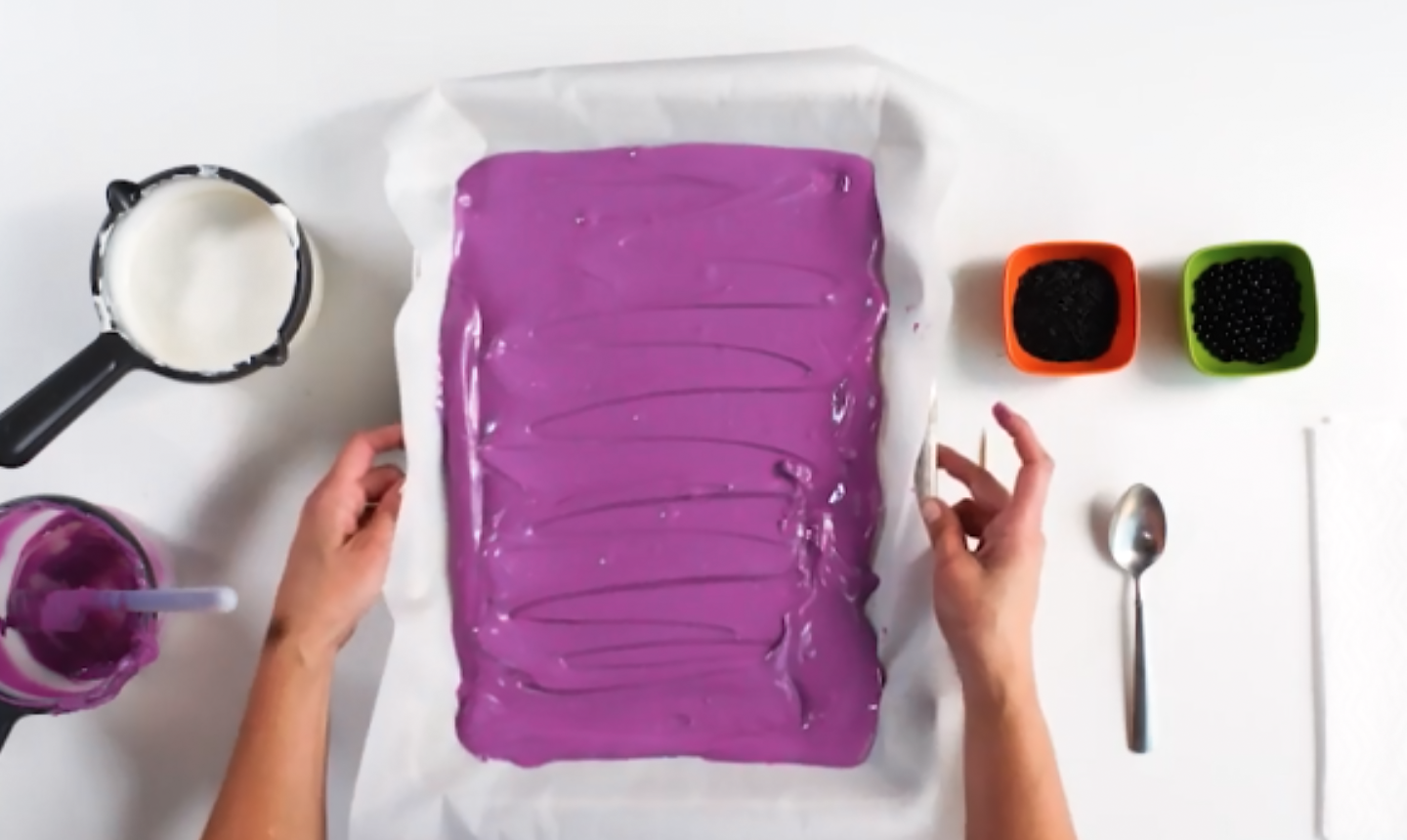 purple candy melts in a baking sheet