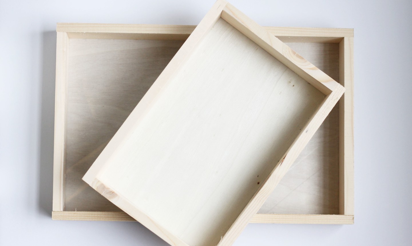 two wooden storage trays