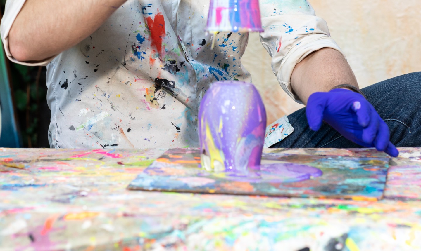 pouring paint on wine glass