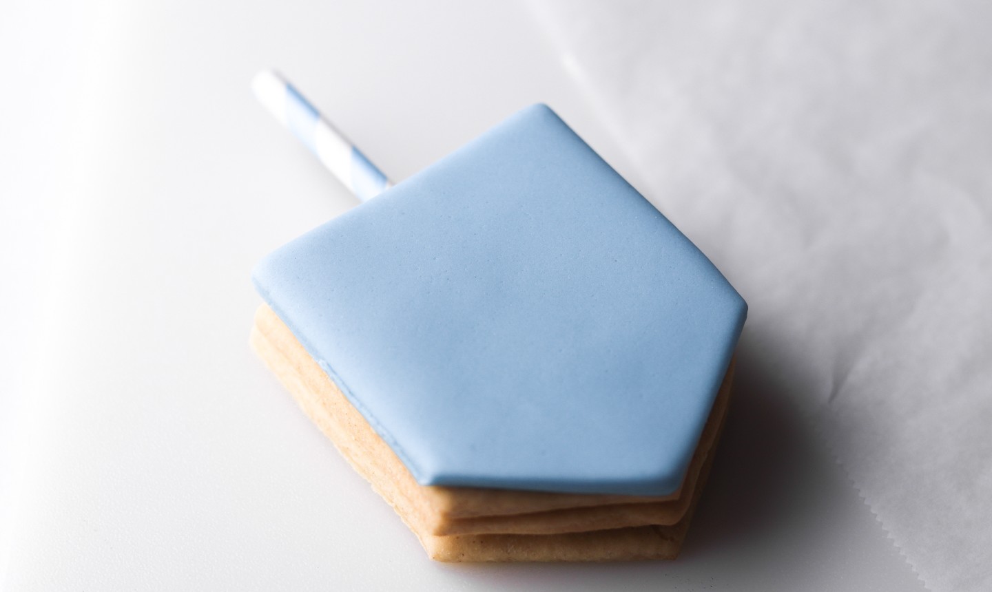 dreidel cookie with blue fondant