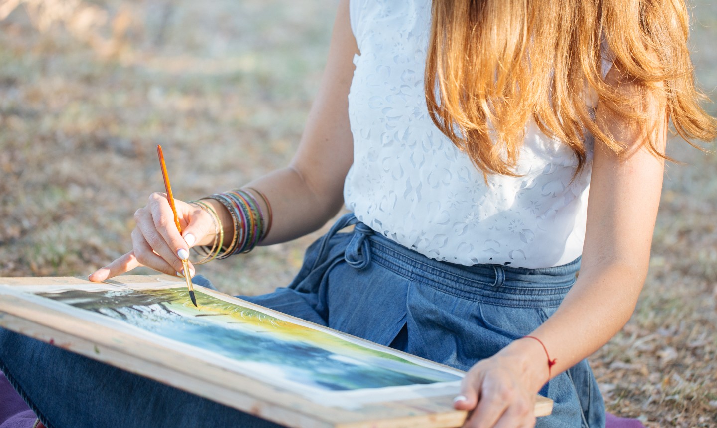 woman painting outside