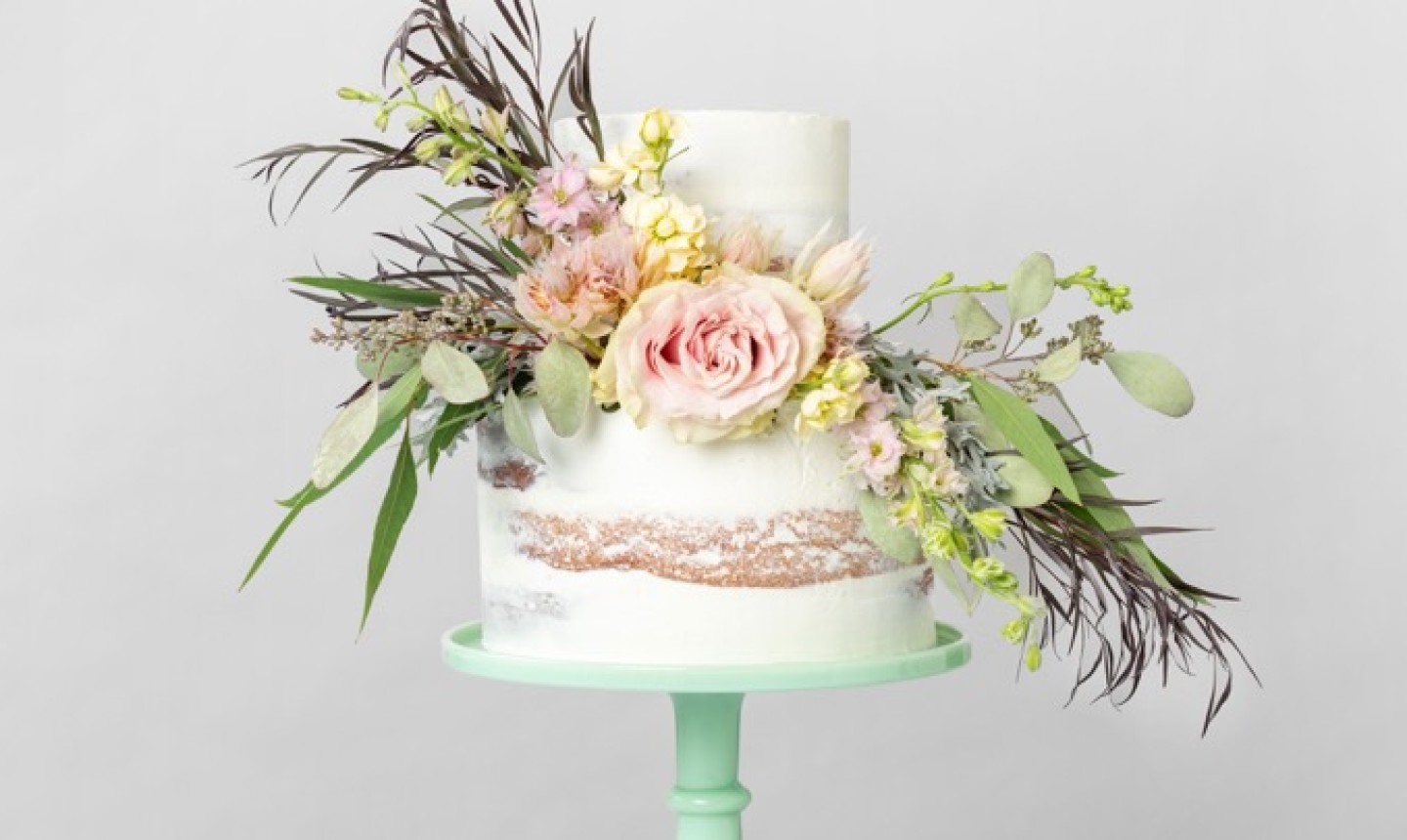 naked cake with flowers