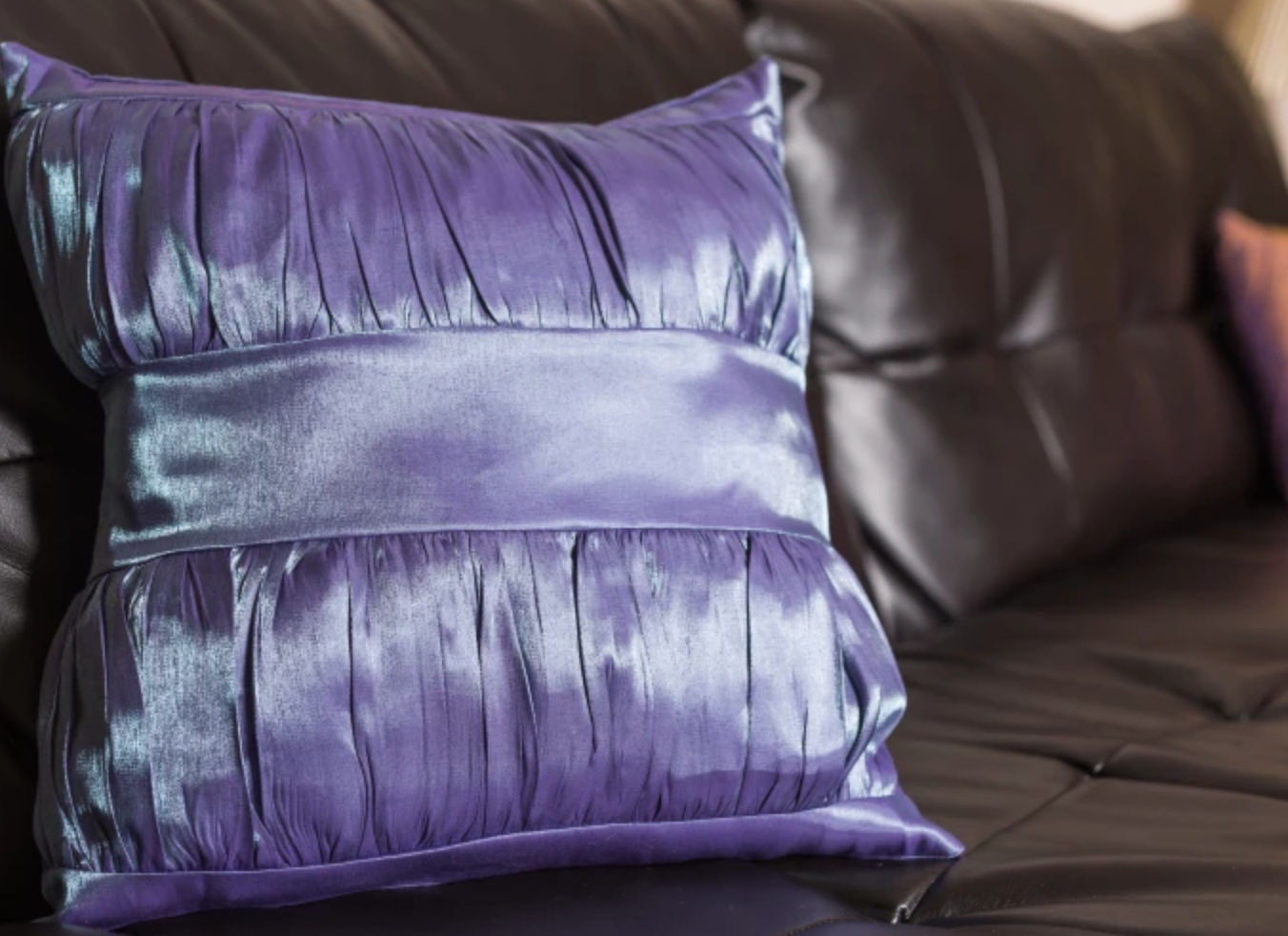 purple pintucked pillow