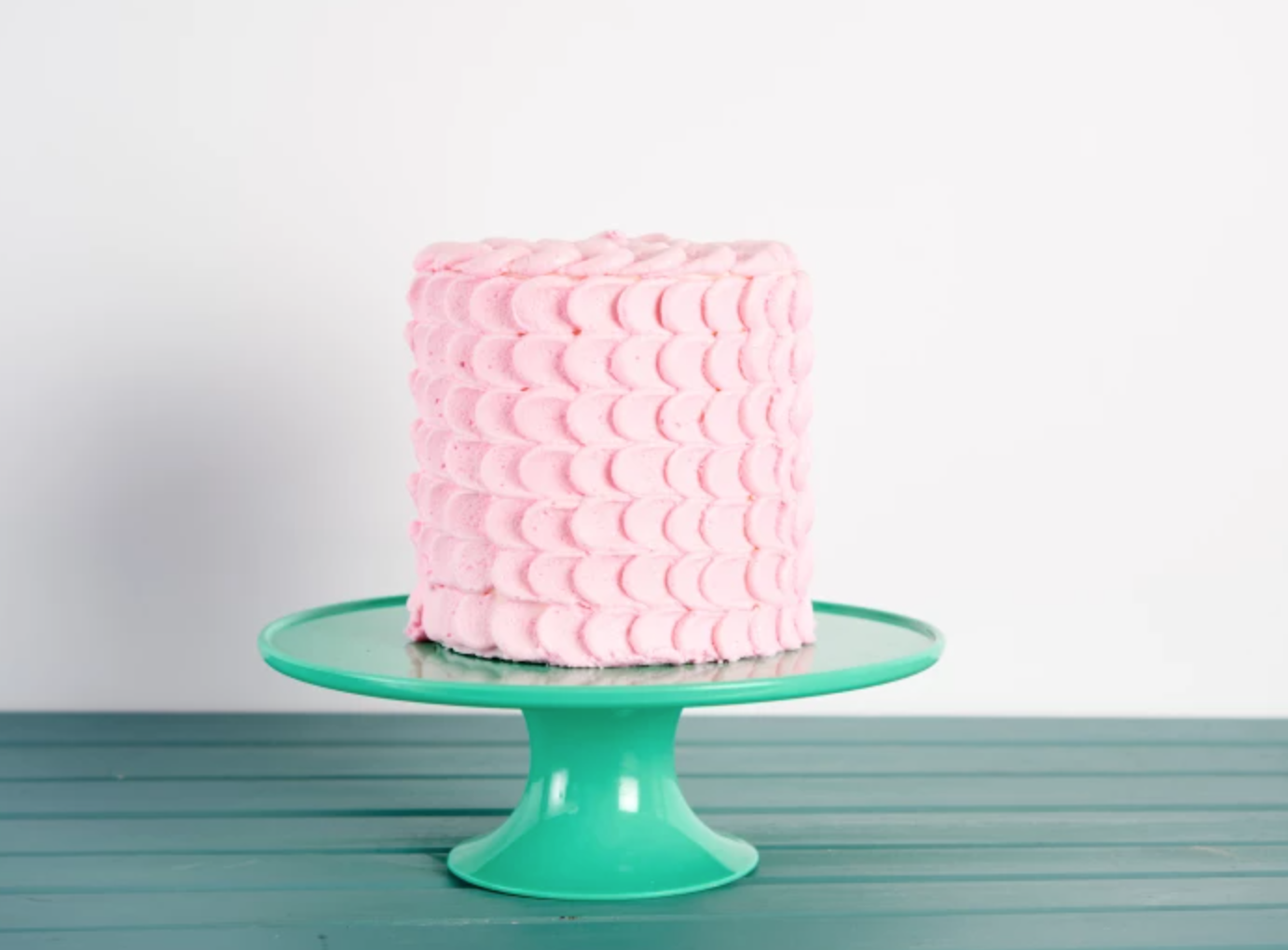 Pink petal piped cake