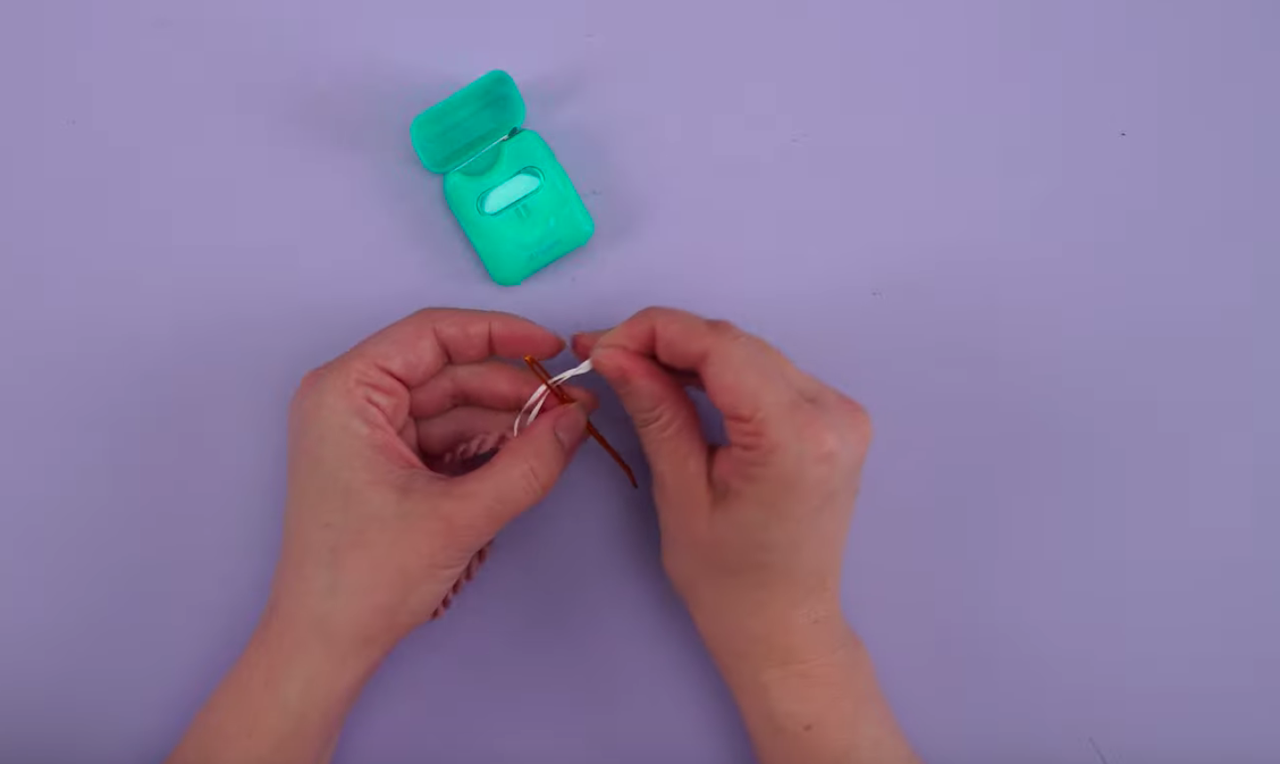 threadding yarn with dental floss