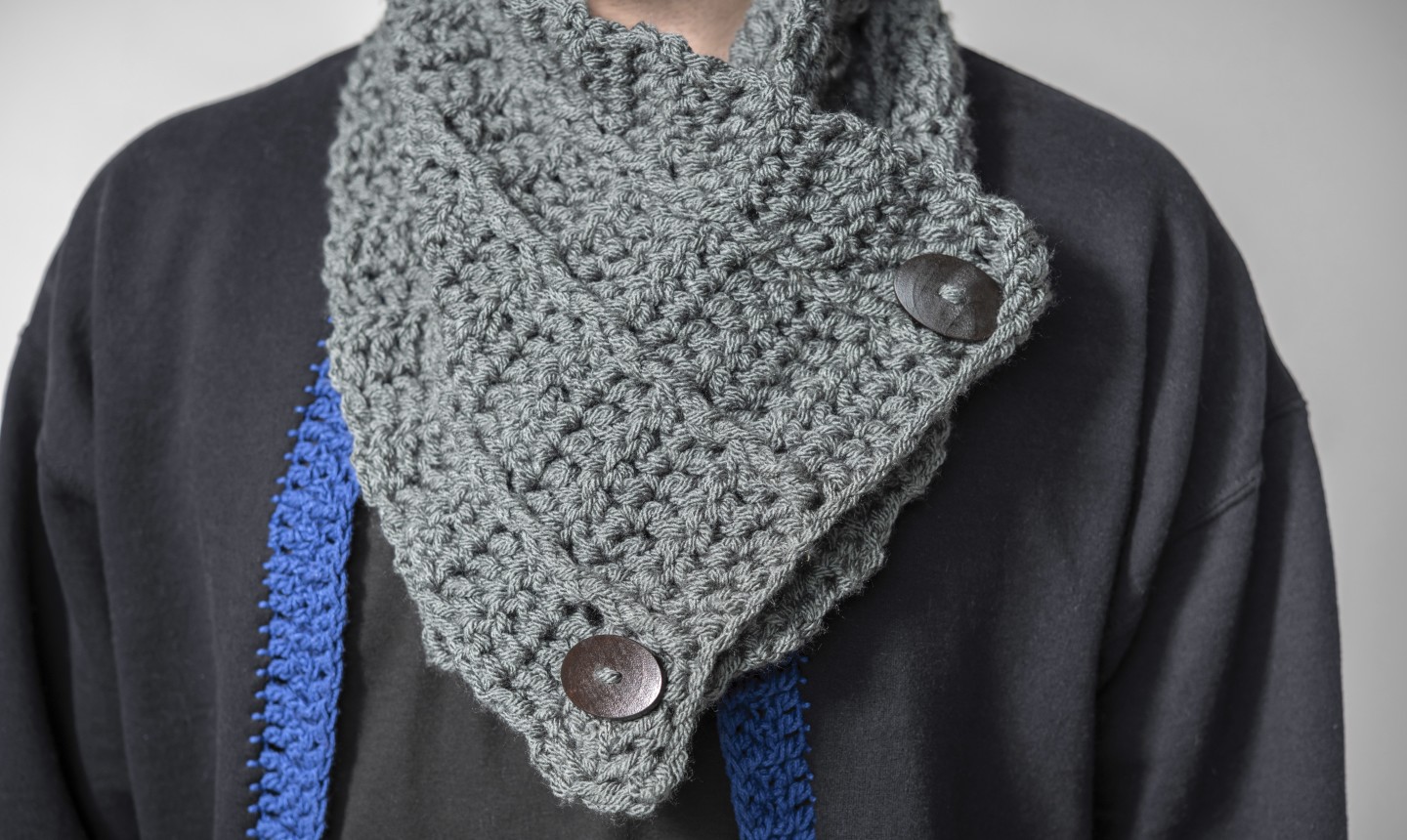 man wearing crochet cowl