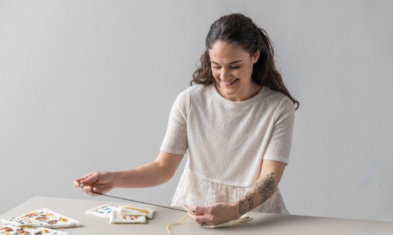 annie lupton embroidering knit sweater