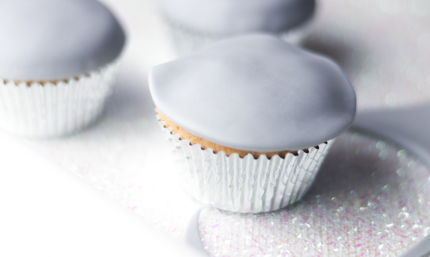 cupcakes covered in gray fondant