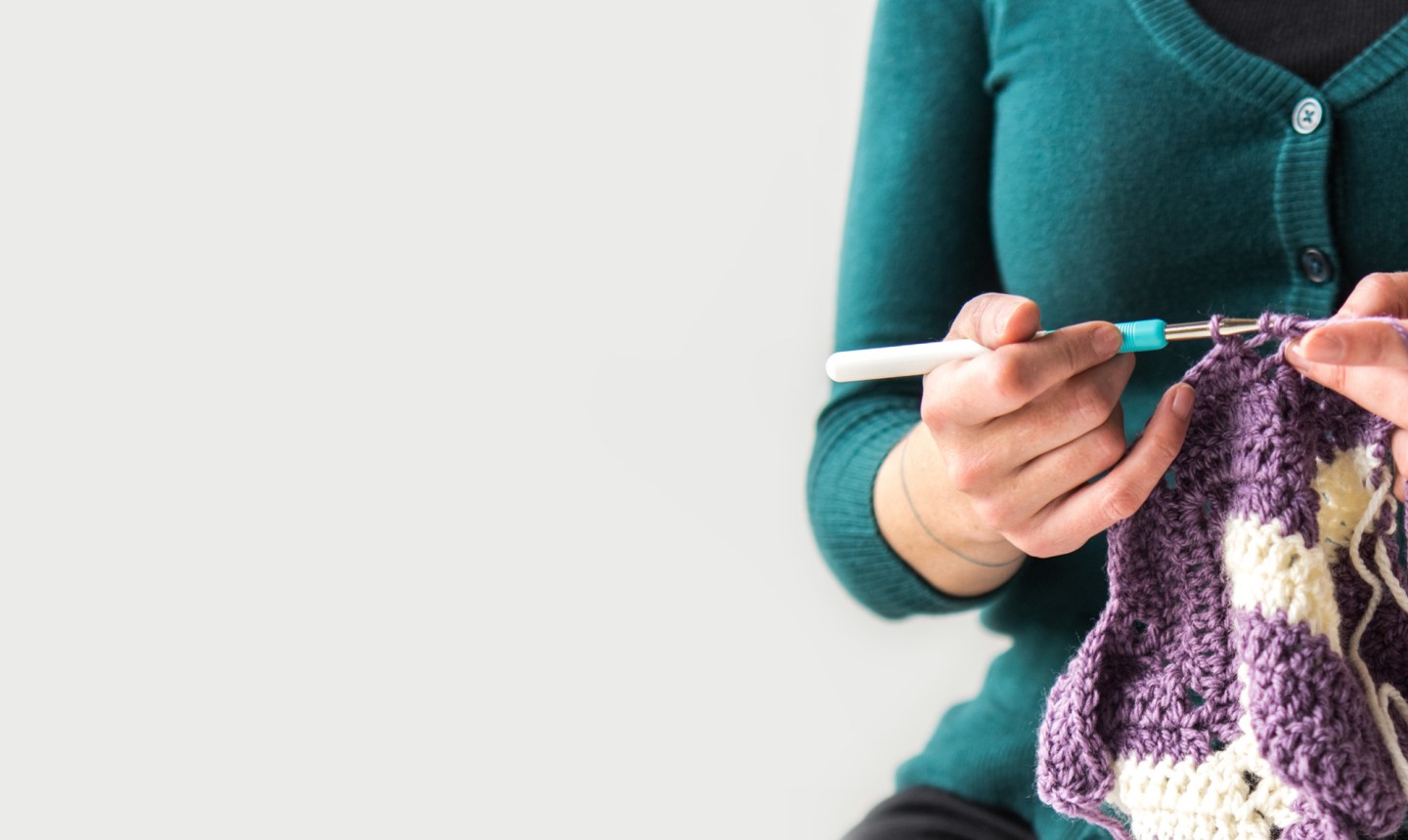 woman crocheting