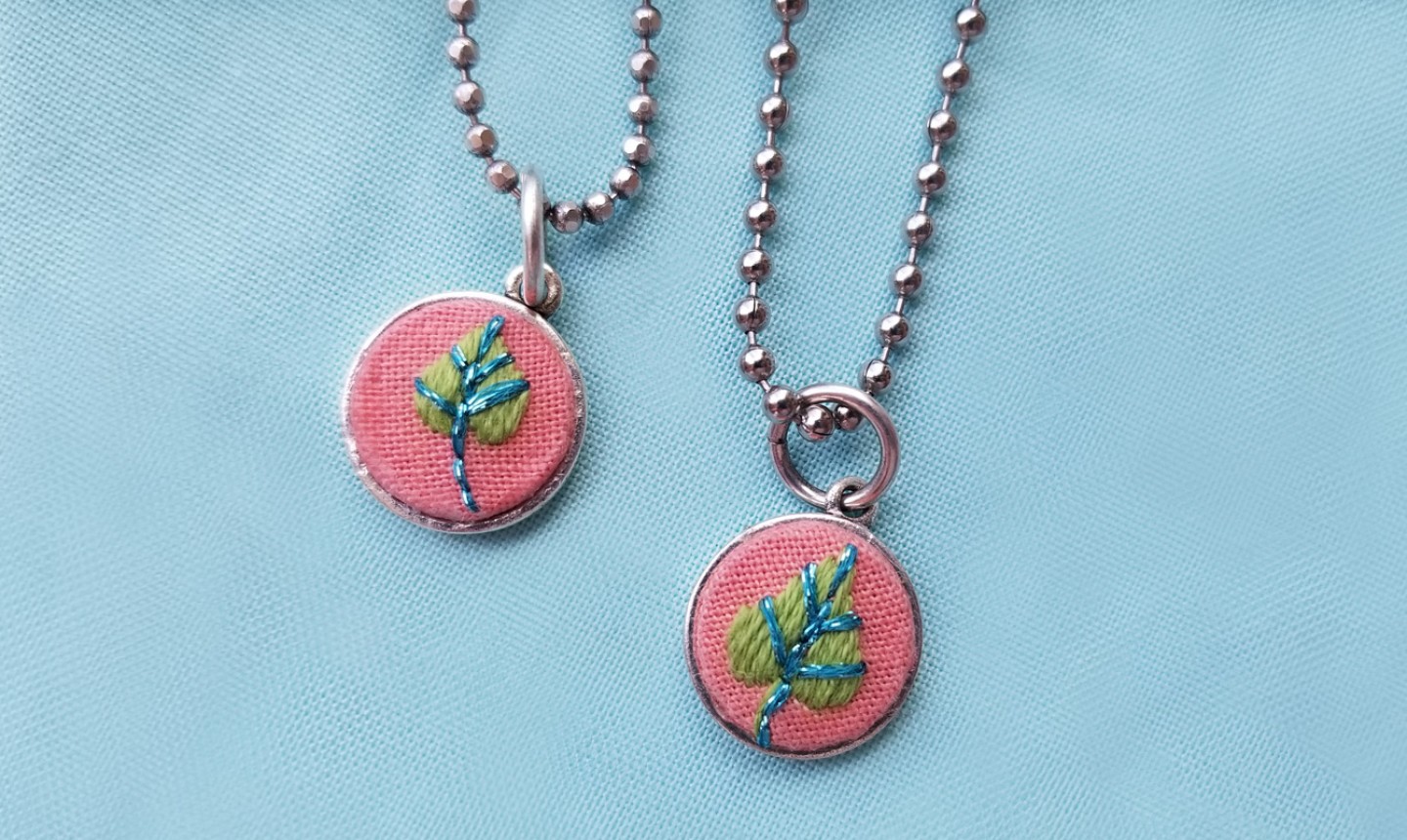 embroidered leaf pendants