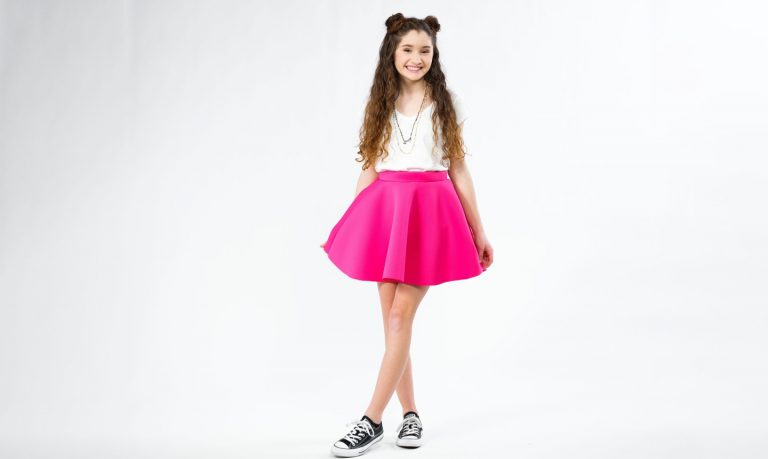 girl wearing pink circle skirt