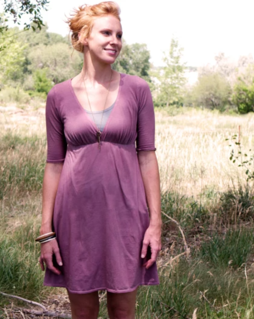 woman wearing purple dress