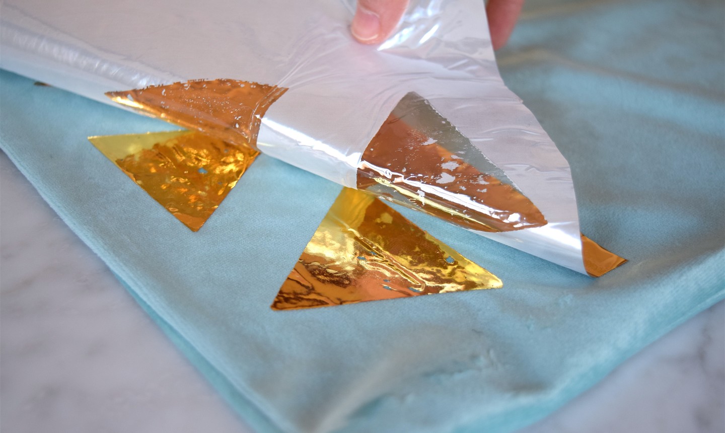 making gold triangle pillow