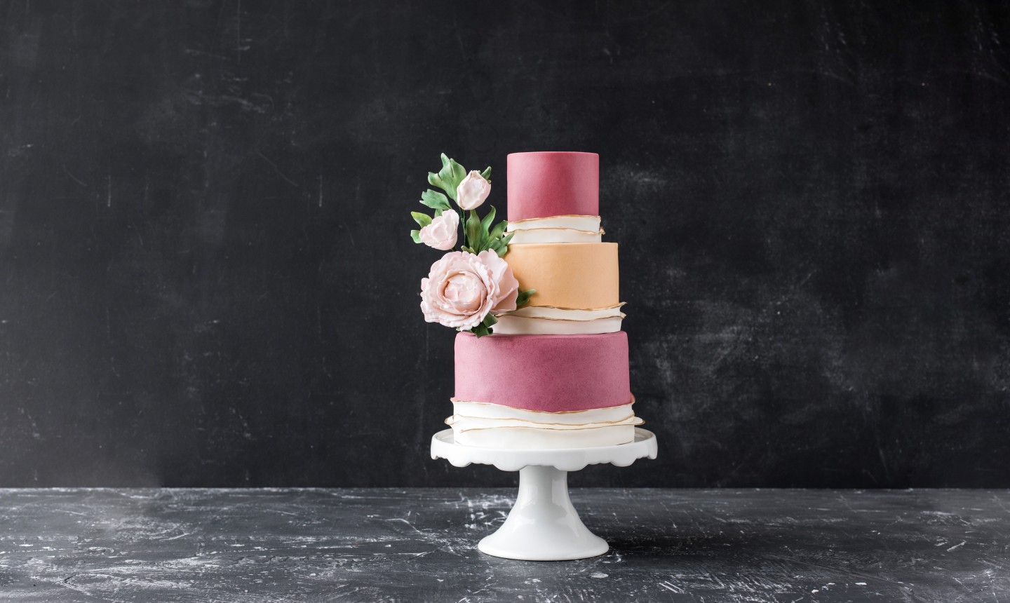 pink and beige floral tiered cake