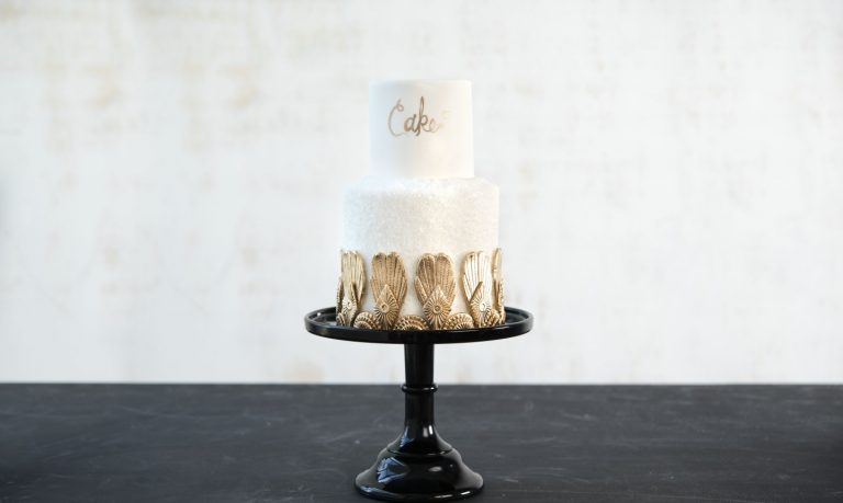 wedding cake with gold accents