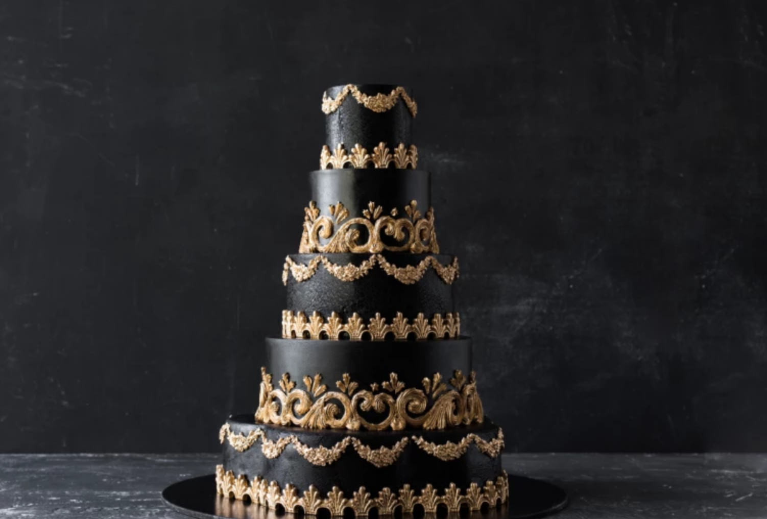 Classic Black And Gold Cake With Gold Ornaments