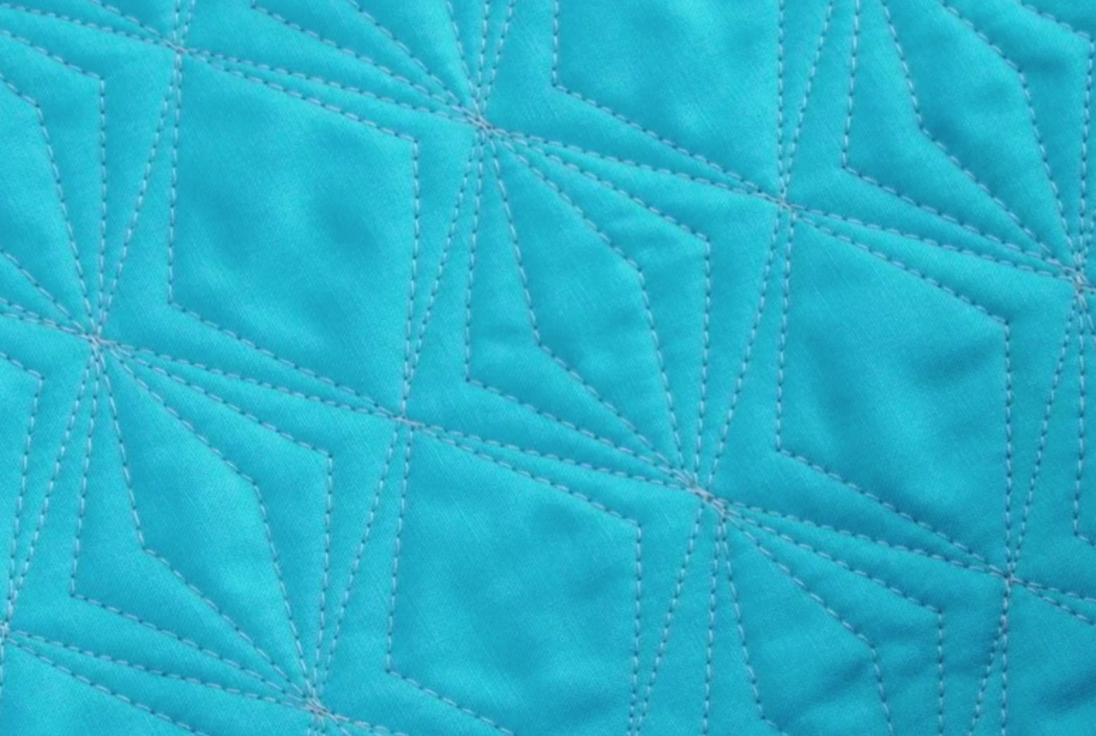 walking foot quilted diamonds on blue fabric