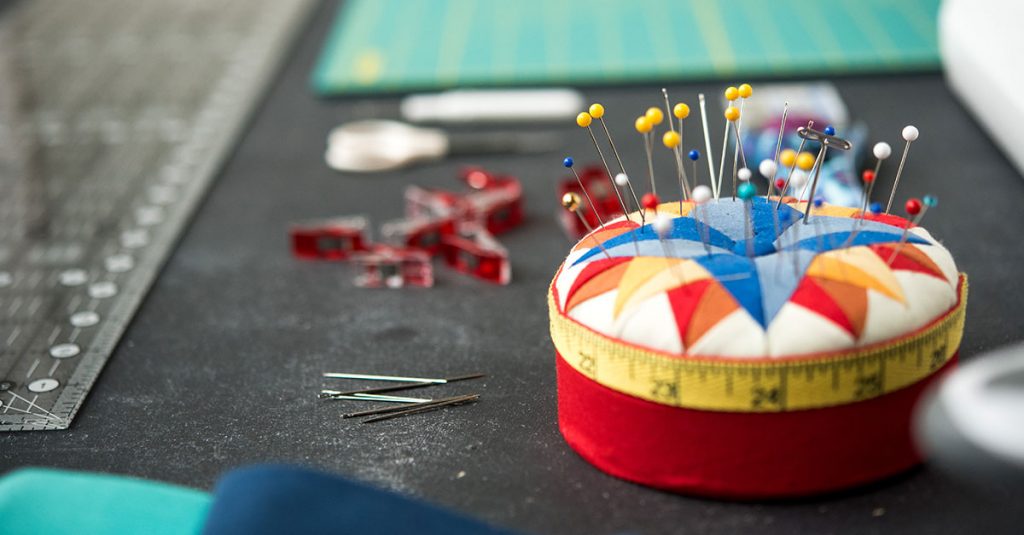 Pin cushion with needles