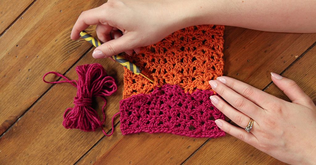 Crocheting a rectangle with pink and orange yarn