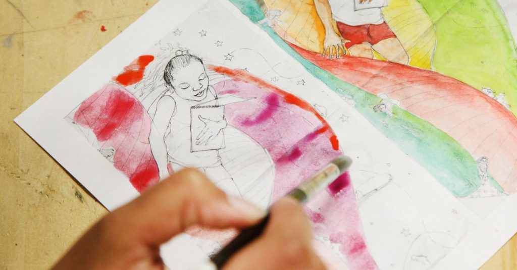 Painting watercolor on a picture book picture