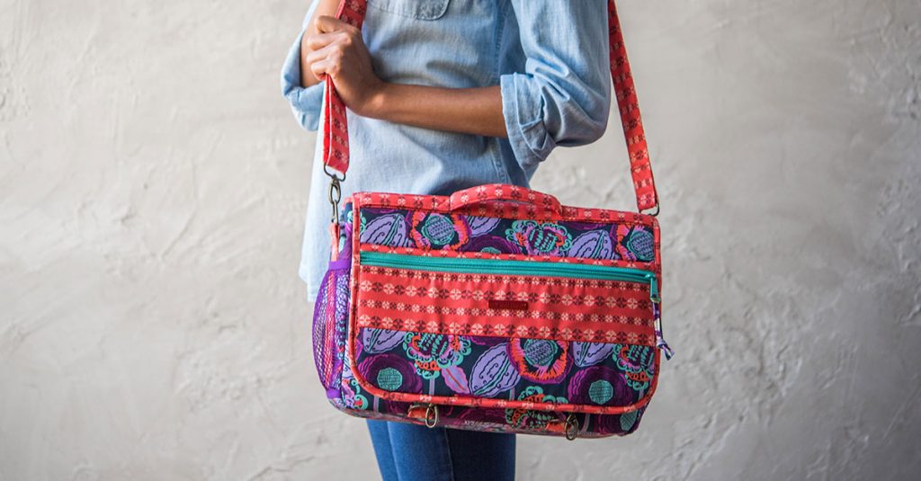 Person wearing a colorful messenger bag