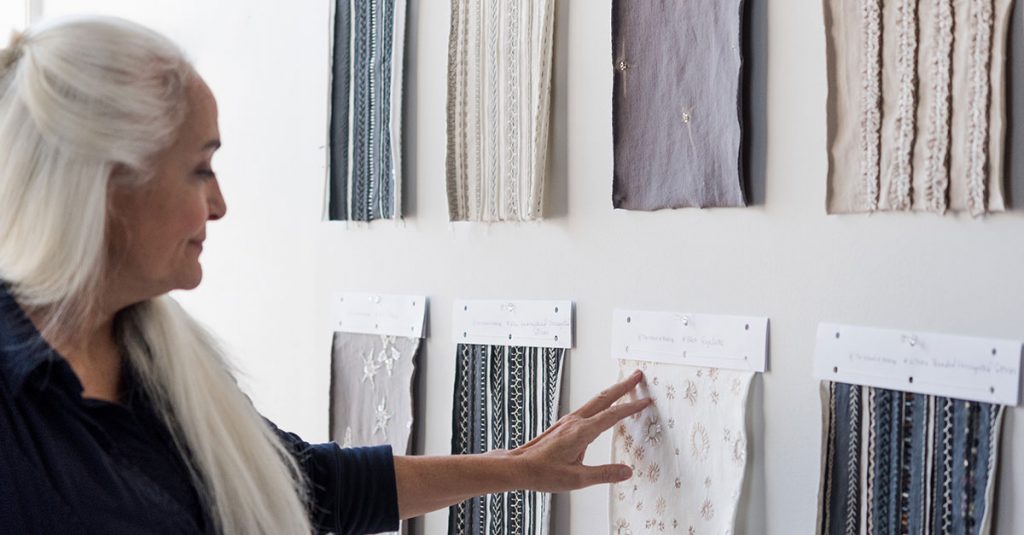 Woman looking at fabric swatches