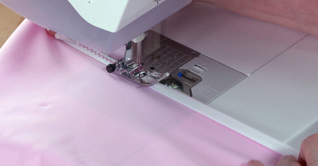 Sewing elastic with a sewing machine