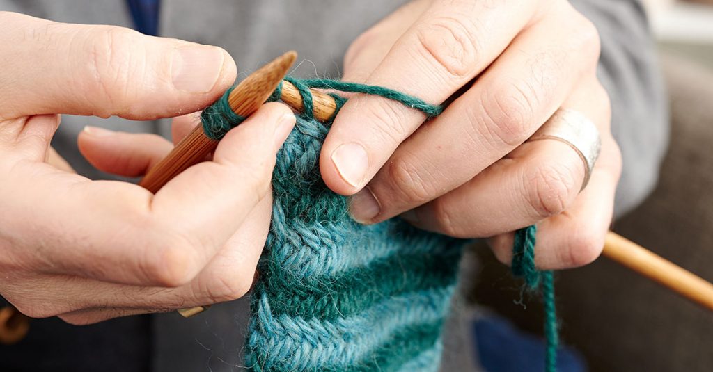 Knitting with green yarn