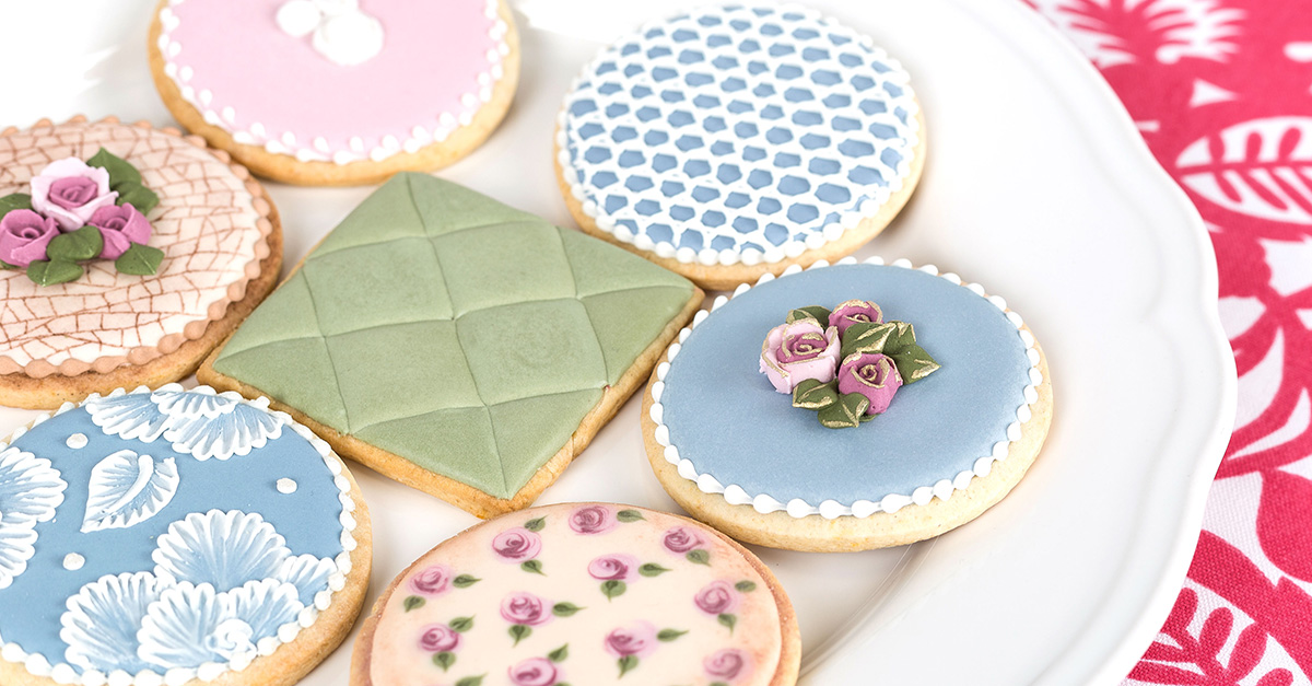 Elegantly decorated sugar cookies on a plate