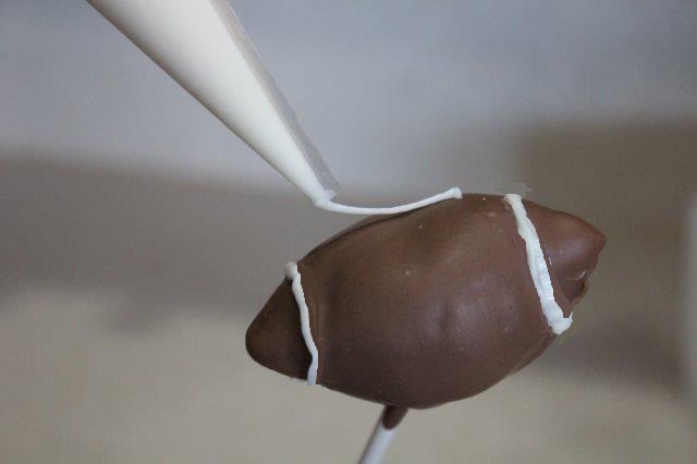 Adding Details to Football Cake Pop