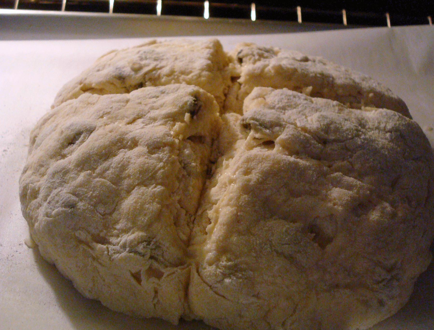 Cutting a Cross Along the Bread Dough