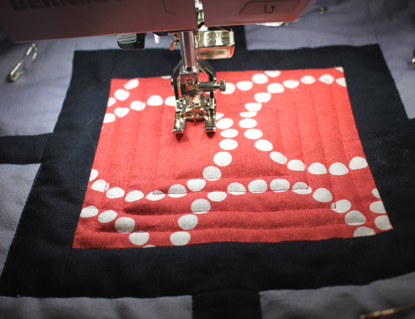 Sewing on a String of Pearls Quilt