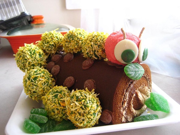 Log Cake Decorated Like a Caterpillar