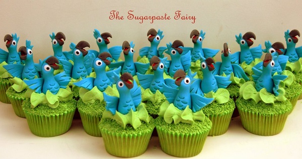 Cupcakes Topped with Parrot Toppers