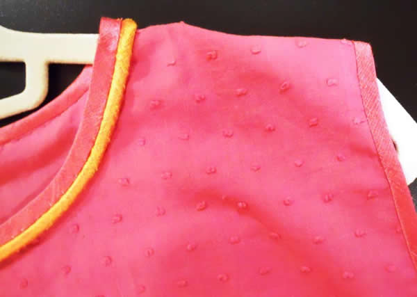 Pink Top with Cording on Neckline 