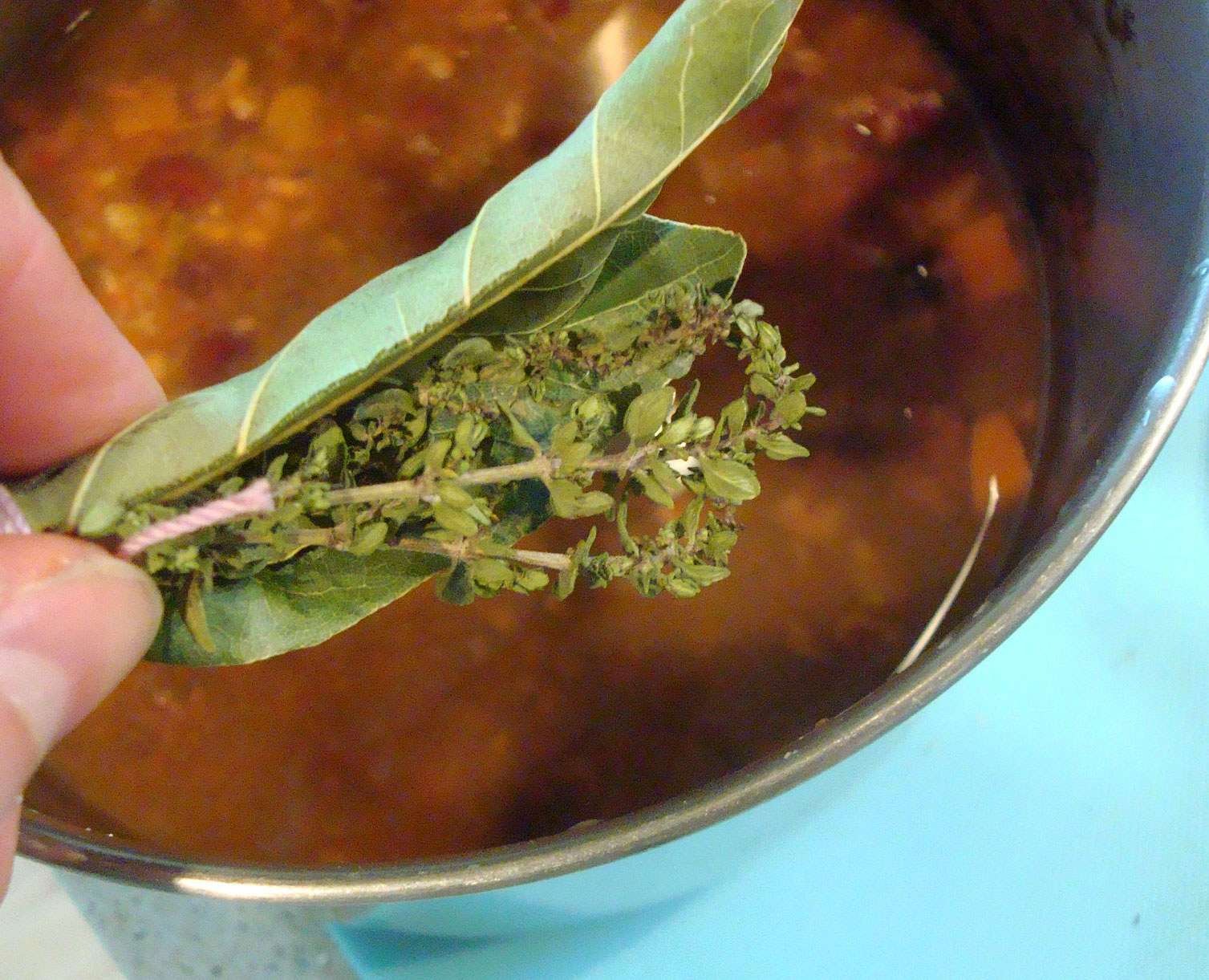 Adding Bouquet Garni Seasoning to Soup