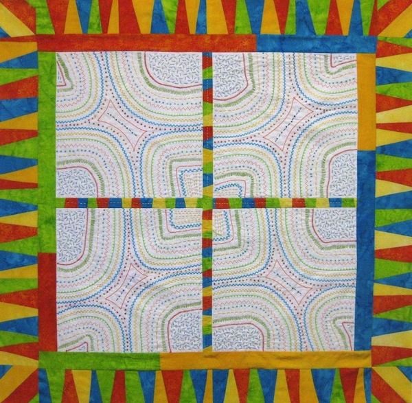 Brightly Colored Improve Pieced Quilt