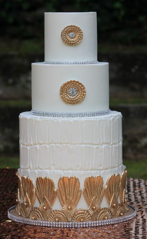 White and Gold Three-Tiered Cake by Joshua John Russell