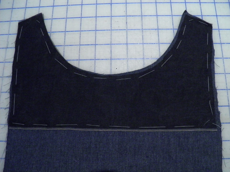 Interfacing basted to bodice front and neckline