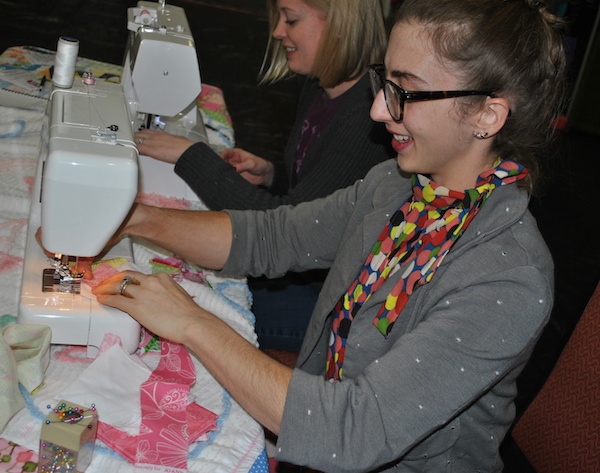 Women Sewing at a Quilting Retreat