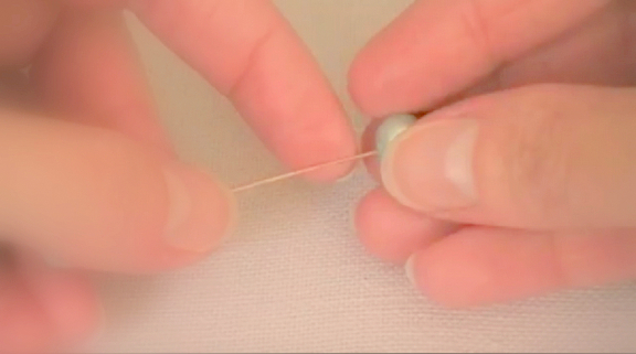 Bead Being Strung on Wire