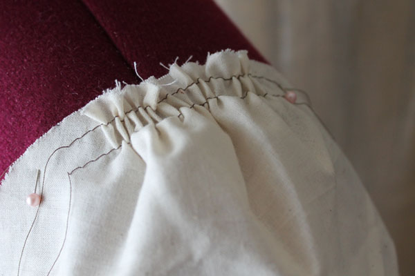 Muslin Sleeve Being Sewn on a Dressform