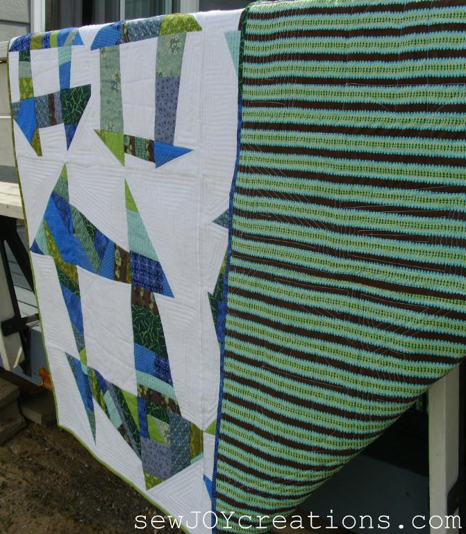 Liberated Churn Dash Quilt - Pattern available on Craftsy