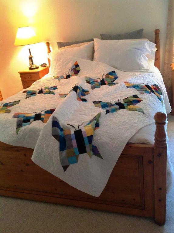 Butterfly Quilt on Bed