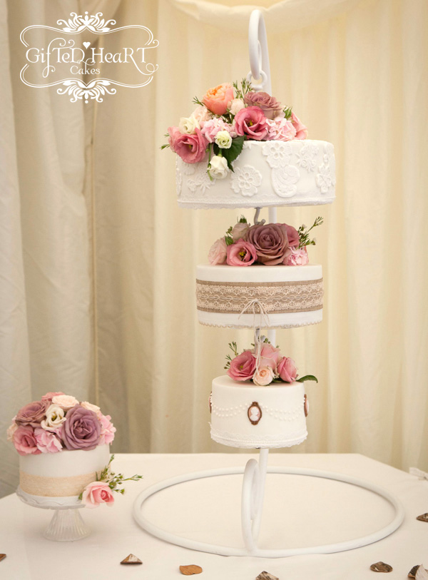 Pink rose hanging wedding cake by Gifted Heart Cakes